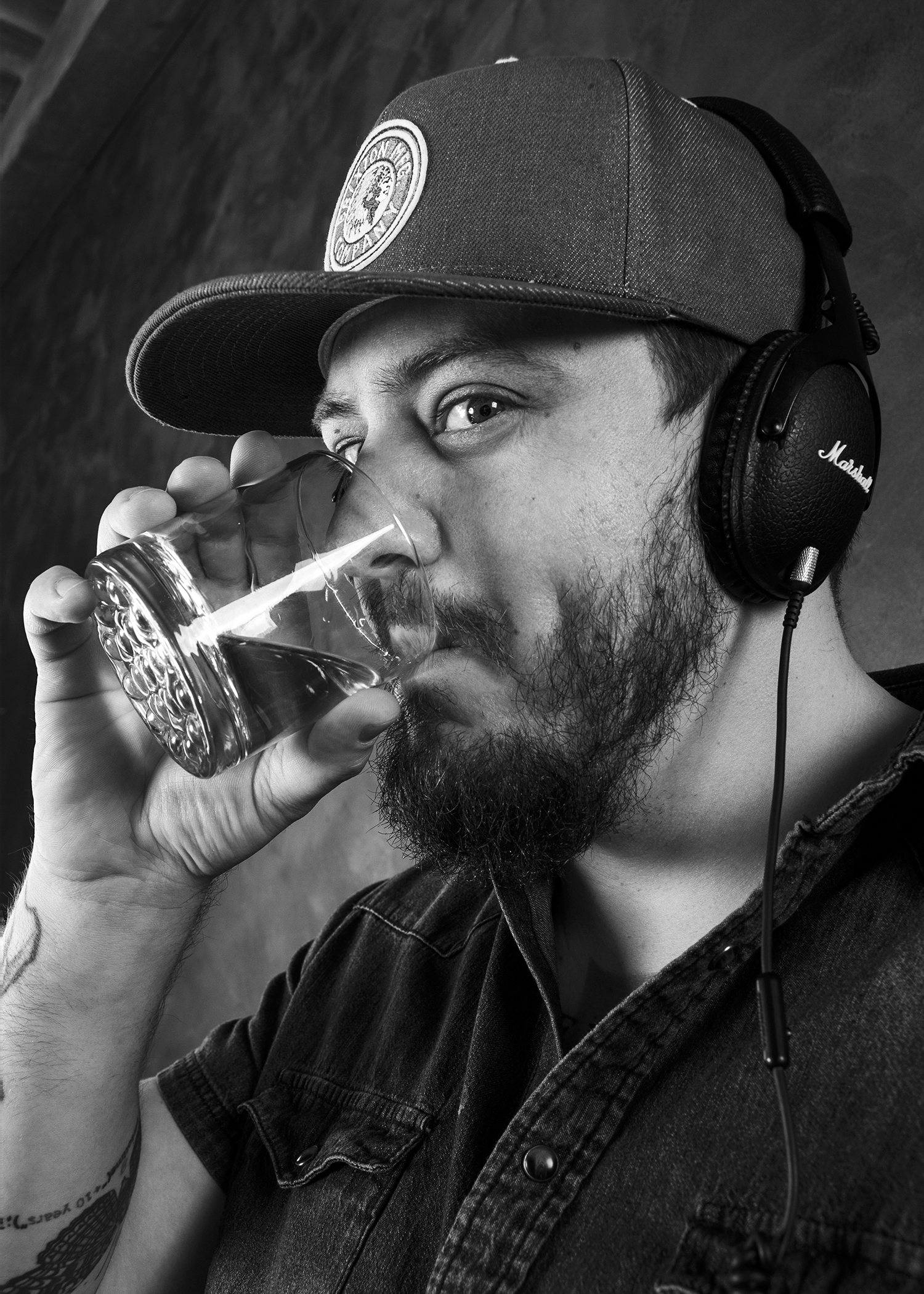 Bear the Astronot wearing headphones in the studio